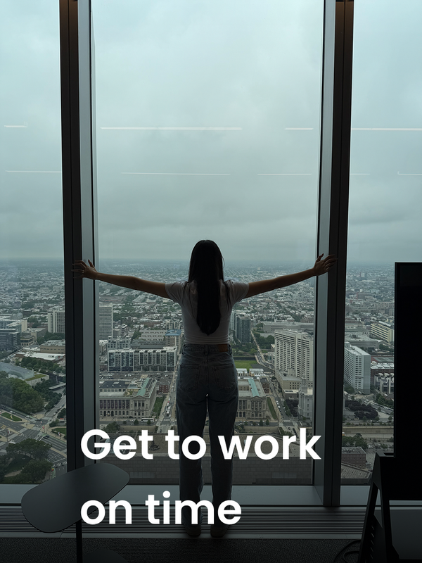 Person standing by a large window with a cityscape view, with text 'Get to work on time'.